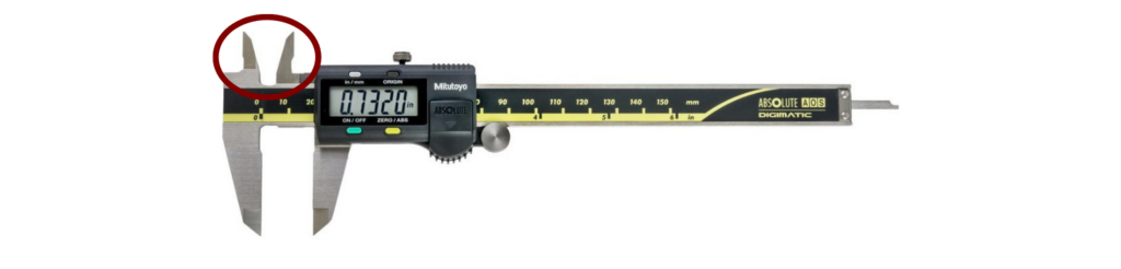 Calibrated digital caliper measuring precision with digital display.